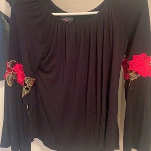 Black blouse with roses